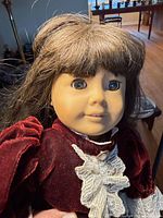 Close-up of doll face and bodice detailing