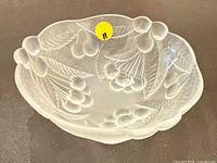 Top view showing overall bowl shape and cherry relief pattern
