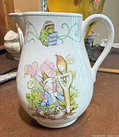 Front view of Peter Rabbit porcelain pitcher