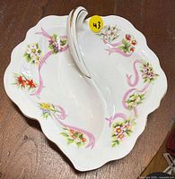 Top view showing floral emblem decoration and shape