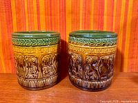 Front view of both planters showing overall design and glaze colors