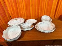 Group view of all Haviland Limoges pieces on sideboard
