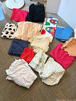 All fabric pieces spread out showing colours and textures