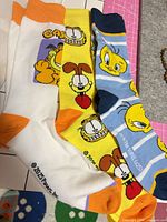 Overall view of three different new character sock pairs