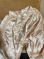 Full view of silk satin pants showcasing overall appearance
