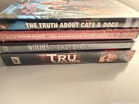 Spine view of the four DVD cases stacked
