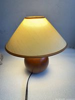 Lamp lit, showing shade color and base