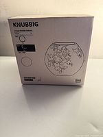 Front of sealed IKEA KNUBBIG box showing model, size and illustration
