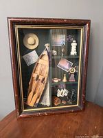 Front view of shadow box showing all miniatures