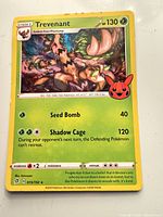 Front of Trevenant holographic rare card showing artwork, stats and numbering 015/192