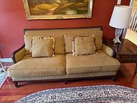 front view of Ethan Allen sofa showing cushions, pillows and wood frame