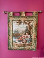 Front view of tapestry and rod on wall