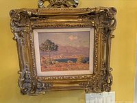 Front view of framed landscape print
