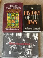 Front covers of all three books laid side by side