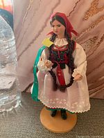 Fabric Eastern European woman doll on stand