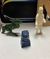 All three figurines grouped for identification