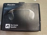 Retail box front showing Bluedio branding and Hurricane Speaker model