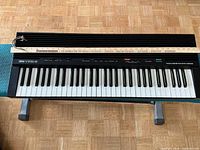 Top view of Yamaha YPR-9 keyboard on surface, shows full keybed and controls