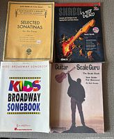 Front covers of all four music books