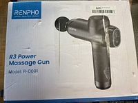 Front of sealed box showing Renpho R3 Power Massage Gun image and branding