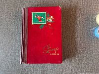 Front cover of red Stamp Album