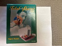 Front of box showing Total Shaver 2000 Super Razor model HC-6800