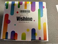 Front of colorful Vishine retail box