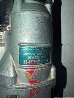 Close-up of Hitachi NV83 label on nailer body