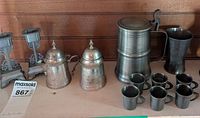 Group shot showing all pewter pieces on shelf