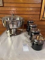 Full lot showing chafing dish next to four canisters