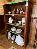 Front view showing full bookcase and shelves