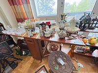 Top view of table fully extended with items on surface