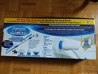 Front of Hurricane Spin Scrubber retail box showing product and features