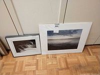 Both framed prints side by side showing size difference and mats
