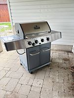 Full view of Broil-Mate propane grill on patio