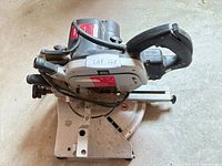 Overall view of Elu mitre saw with power cord and base