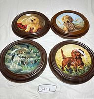 All four framed collector plates