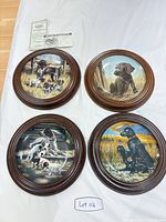 All four framed plates with COA visible