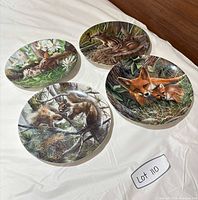 front view four plates wildlife art