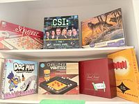 All seven boxed items on two shelf levels