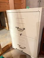Front view showing two drawers, handles, label frames