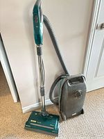 Full vacuum assembled showing canister, hose, wand, and power head