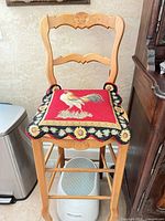 Front view of stool with cushion