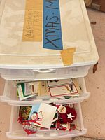 Three-drawer Gracious Living bin labelled XMAS showing contents in drawers