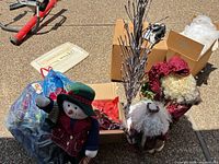 Lot overview showing snowman, LED twig branches, ribbons, boxes