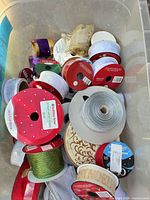 Top view of tote showing assorted ribbon spools