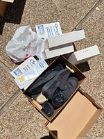 overview of shoes, insoles, garment cover packaging and shoebox