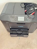 Canon MAXIFY printer front and top view with output tray extended
