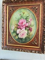 Front view of framed floral painting