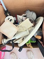 Box contents overview showing immersion blender, mandoline slicer, tray and utensils